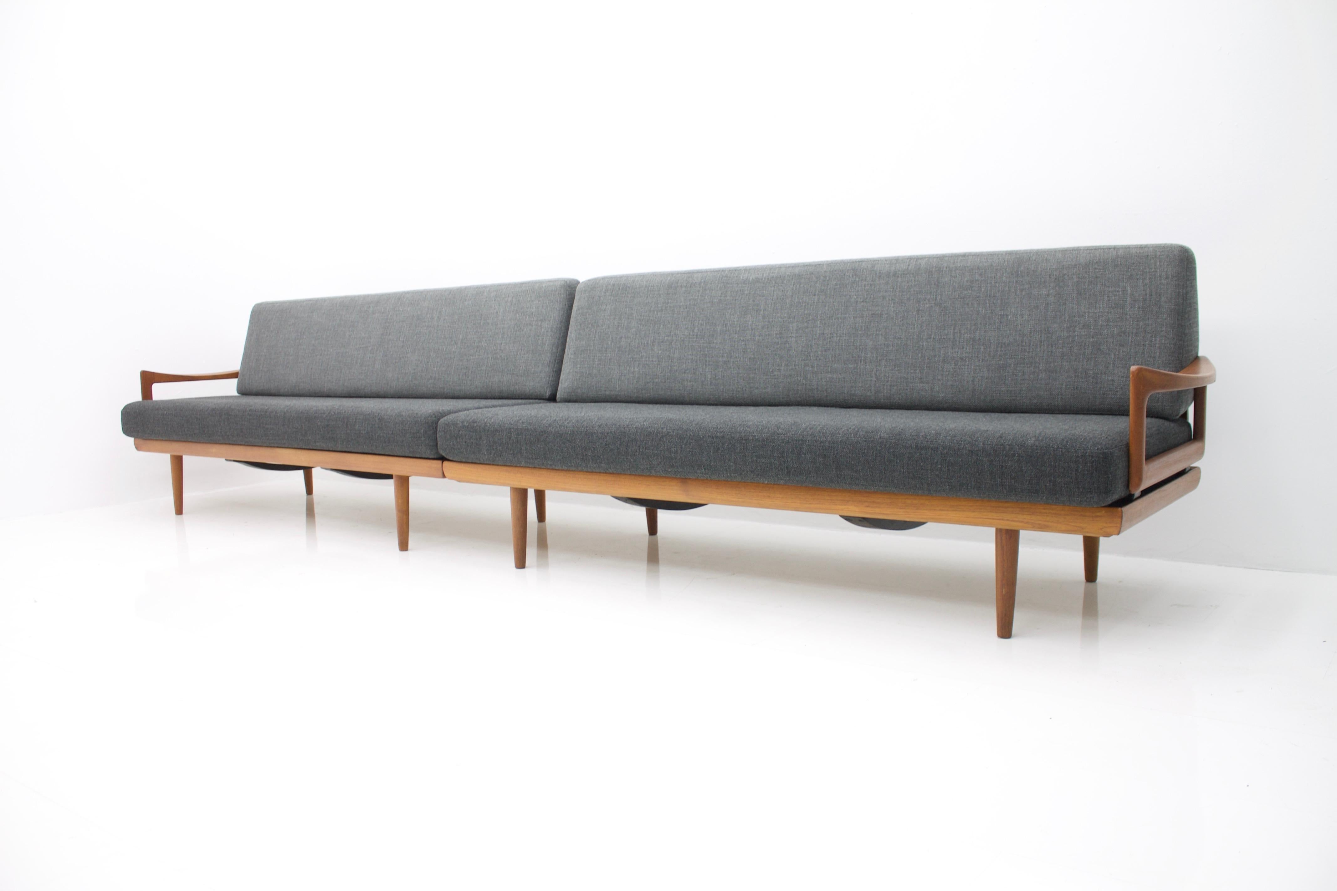 Rare set of two sofas by Tove & Edvard Kindt-Larsen for Gustav Barhus, Norway. Two identical sofas can be placed to a long bench or separately. The armrests can be dismantled on both sides and also be placed as a single daybeds or as a long