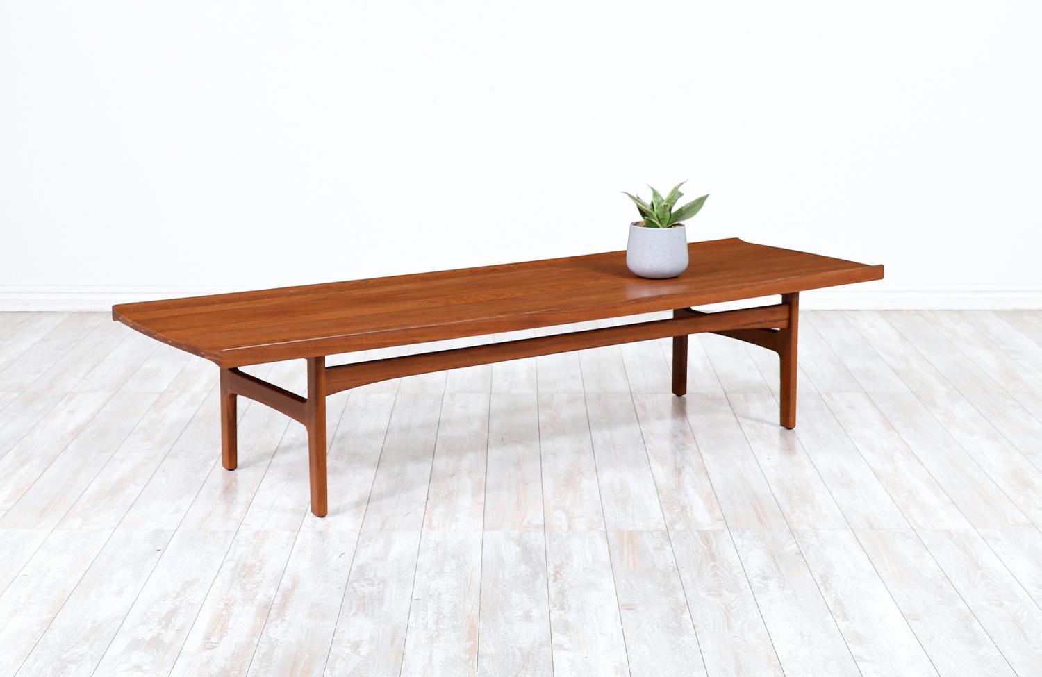 Tove & Edvard Kindt-Larsen teak coffee table by for Dux.

________________________________________

Transforming a piece of Mid-Century Modern furniture is like bringing history back to life, and we take this journey with passion and precision. With