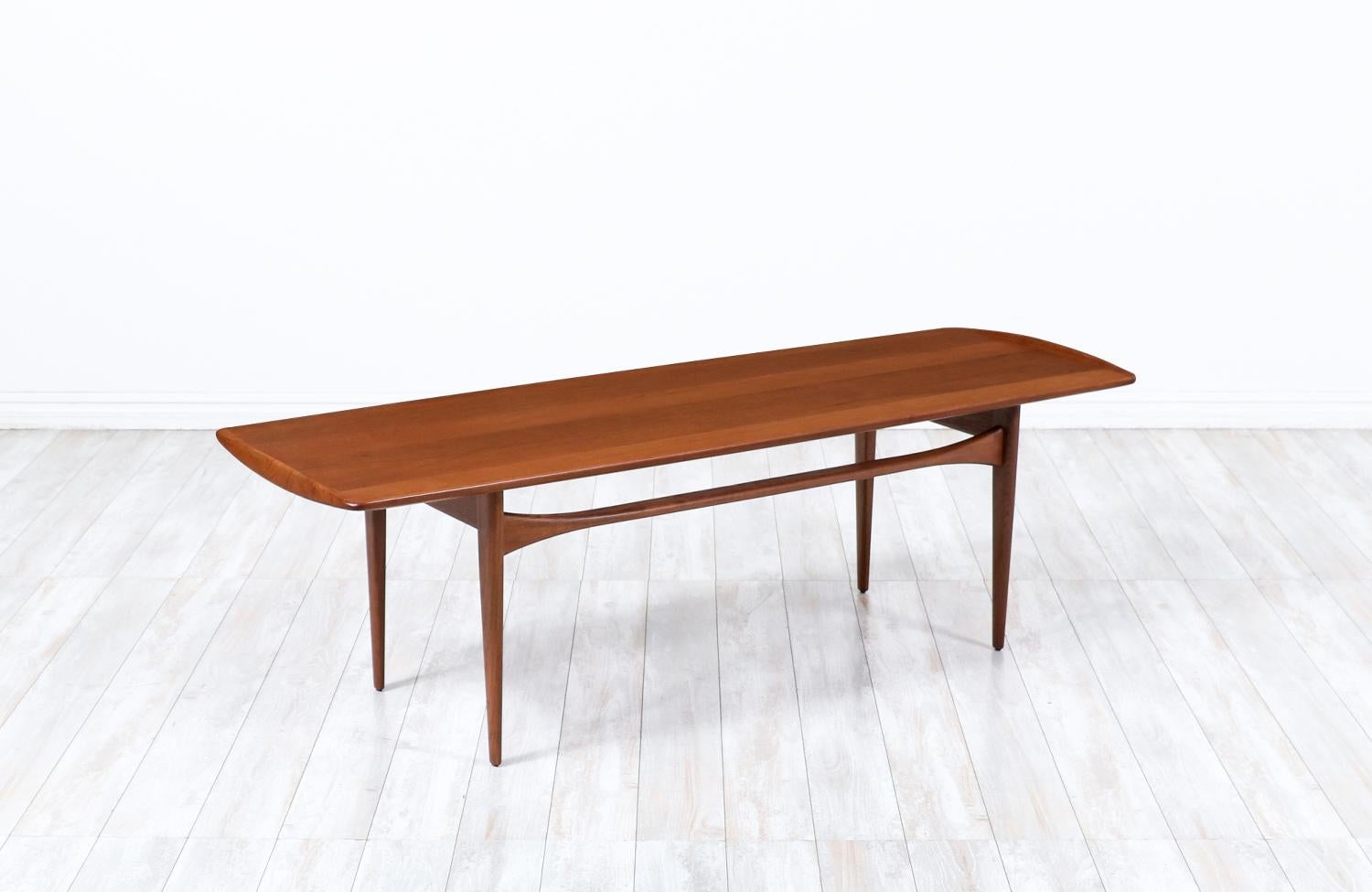 Tove & Edvard Kindt-Larsen Teak Coffee Table for France & Son

________________________________________

Transforming a piece of Mid-Century Modern furniture is like bringing history back to life, and we take this journey with passion and precision.