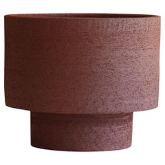 Vase décoratif rouge en forme de tour