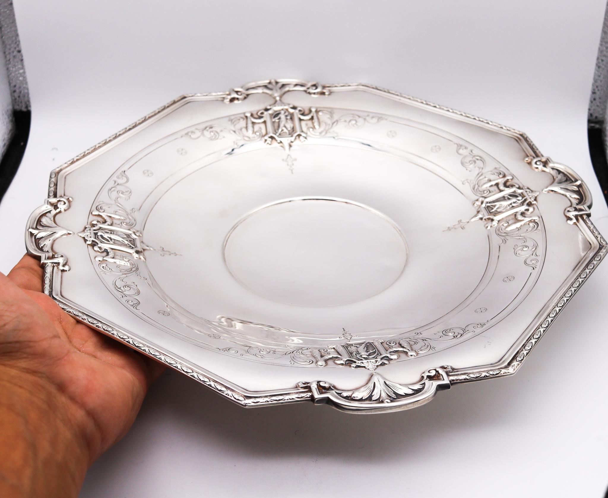 An art nouveau centerpiece designed by Towle & Co.

Beautiful highly elaborated piece, created in the United States by the silversmiths makers Towle & Company back in the end of the 19th century, circa 1895. This fabulous octagonal tray was
