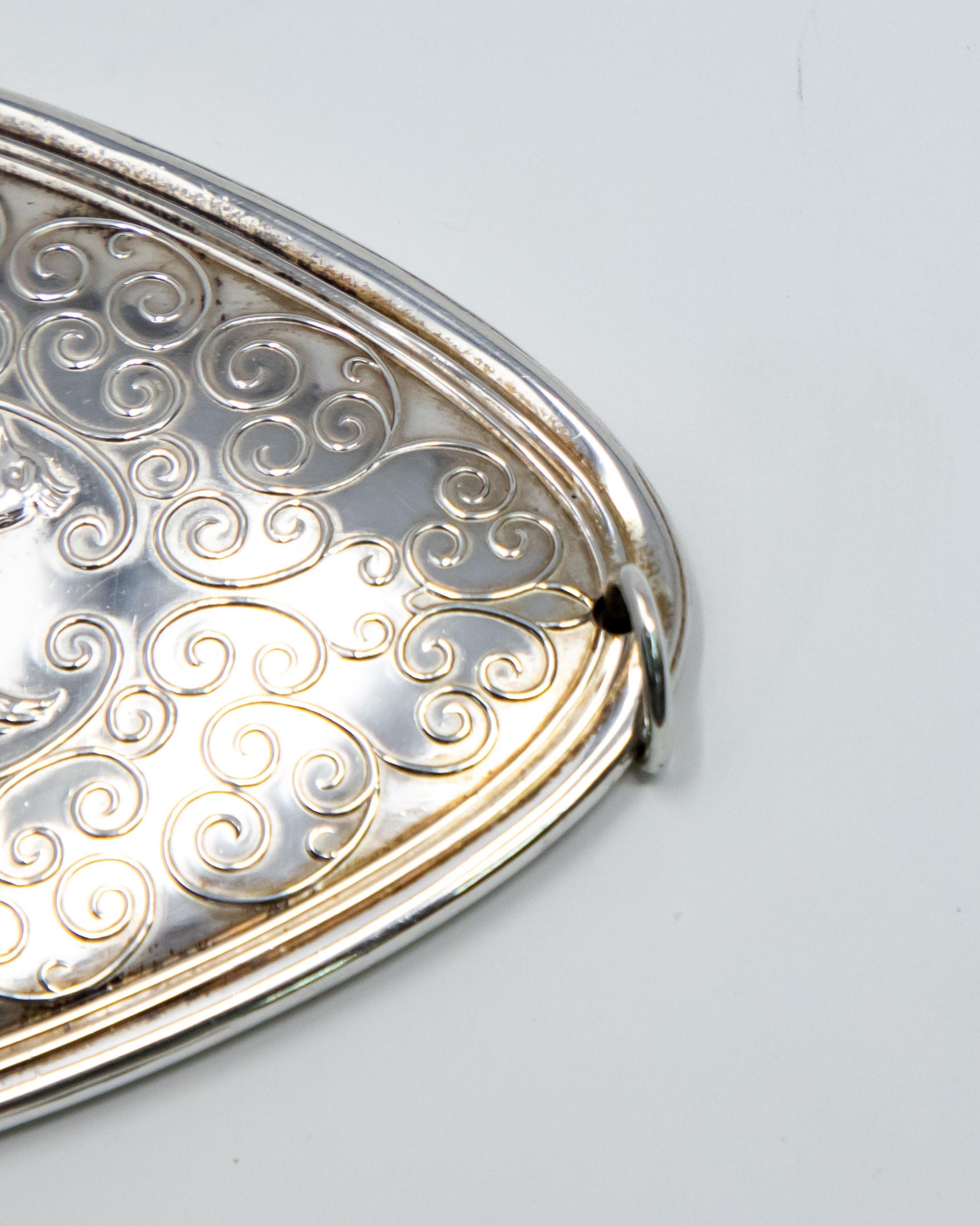Offering this gorgeous Towle sterling ornament from 1973. The front depicts the Three French Hens with lots of scrollwork. Marked Towle Sterling, 1973. The back depicts a foliate and floral design.