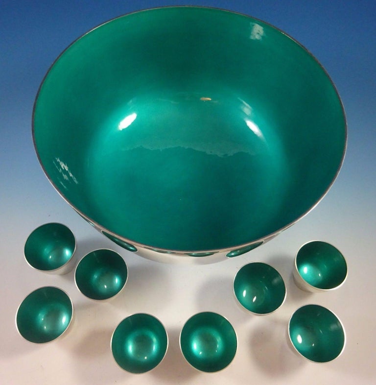 Shop categories helpful links Towle sterling silver punch bowl and cups with turquoise enamel
Towle 

Impressive Towle sterling silver punch bowl and cups. The bowl and cups have a beautiful turquoise interior enamel. They were given as a 25th