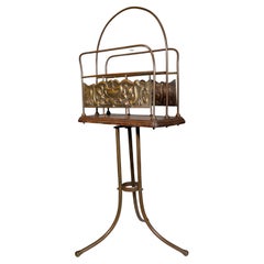 Antique Townshends Brassfounders. An Arts & Crafts revolving tripod magazine rack