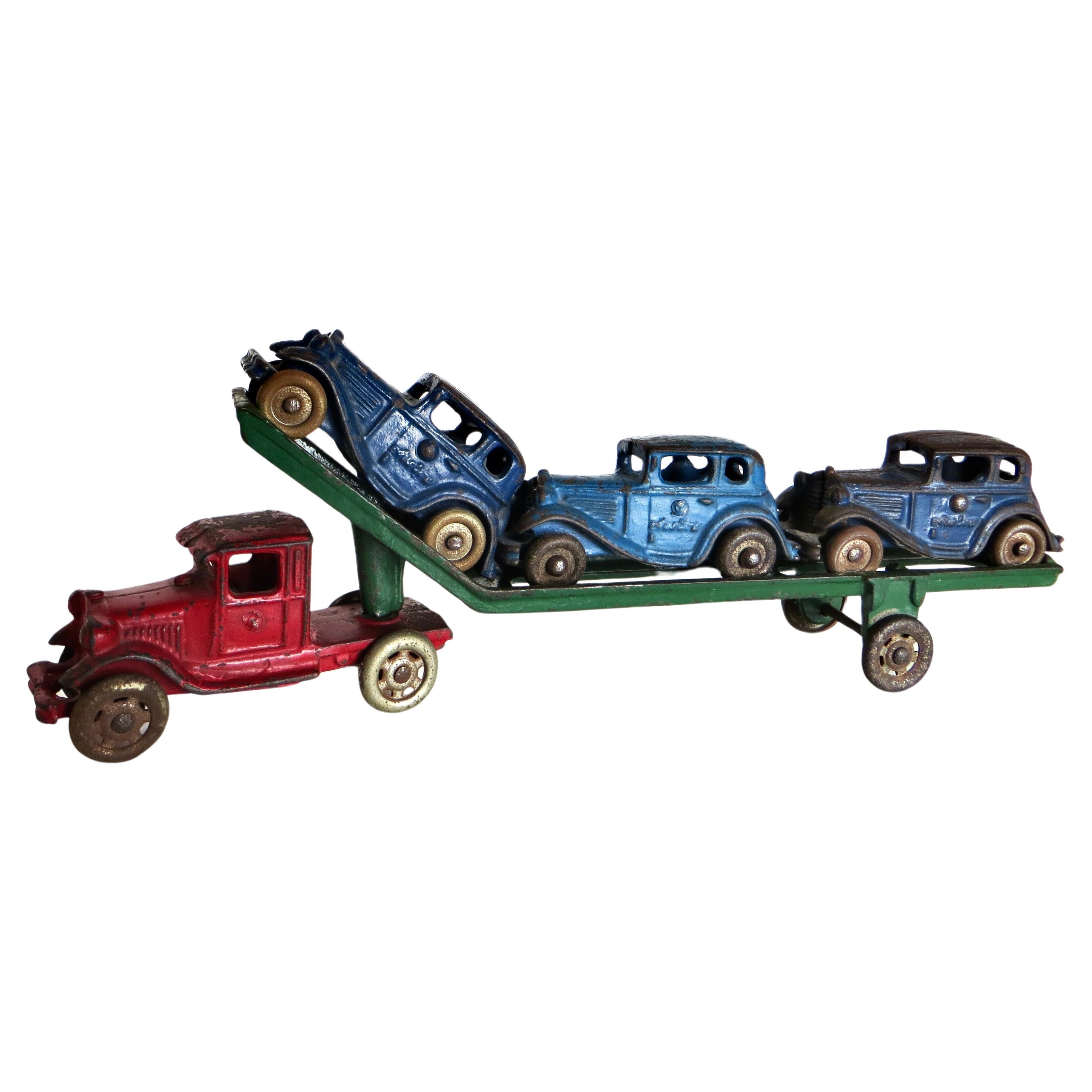Toy Cast Iron Truck Car Carrier; Three Cars by A.C. Williams American Circa 1930 For Sale