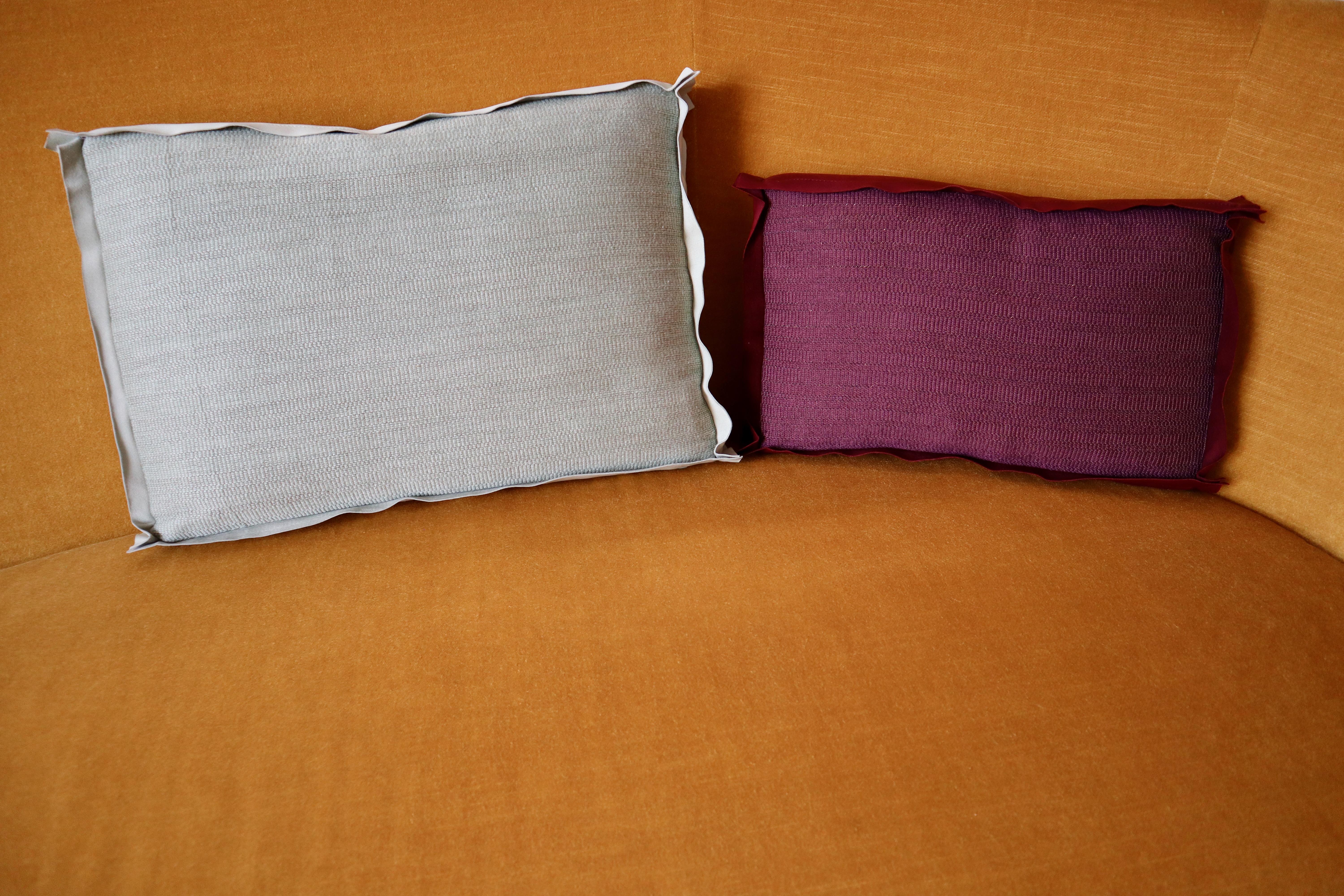 We offer two unique Leather & Fabric Pillow cushions made in France by Toyine.

Toyine’s artisans use their expertise to create unique and exclusive textiles for  interiors. The contemporary fabrics are woven in France on traditional looms with