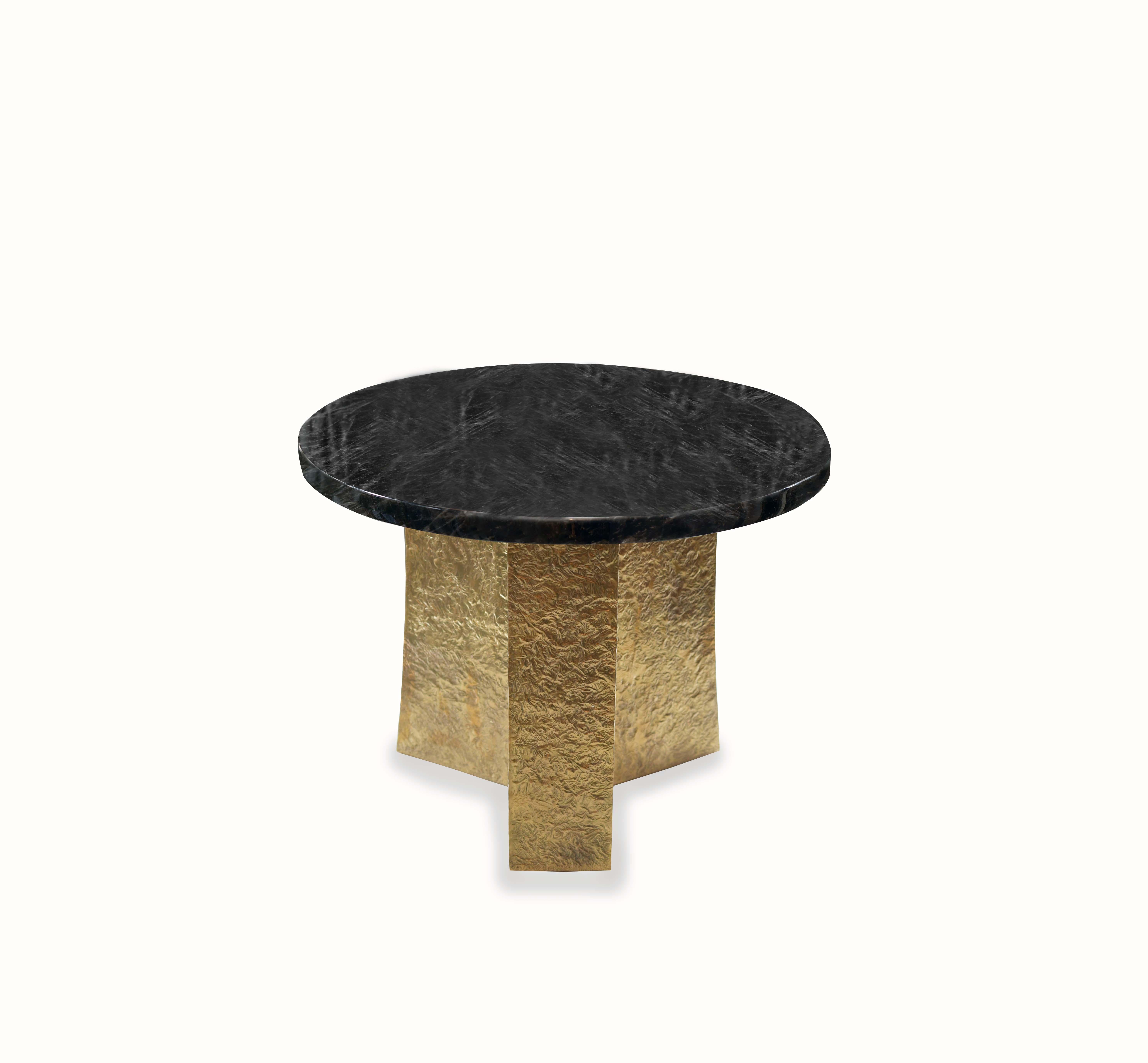 Tri plane table with hammered polish brass stand. Smoky dark
Rock crystal top. Created by Phoenix Gallery.
Custom size and finish upon request.