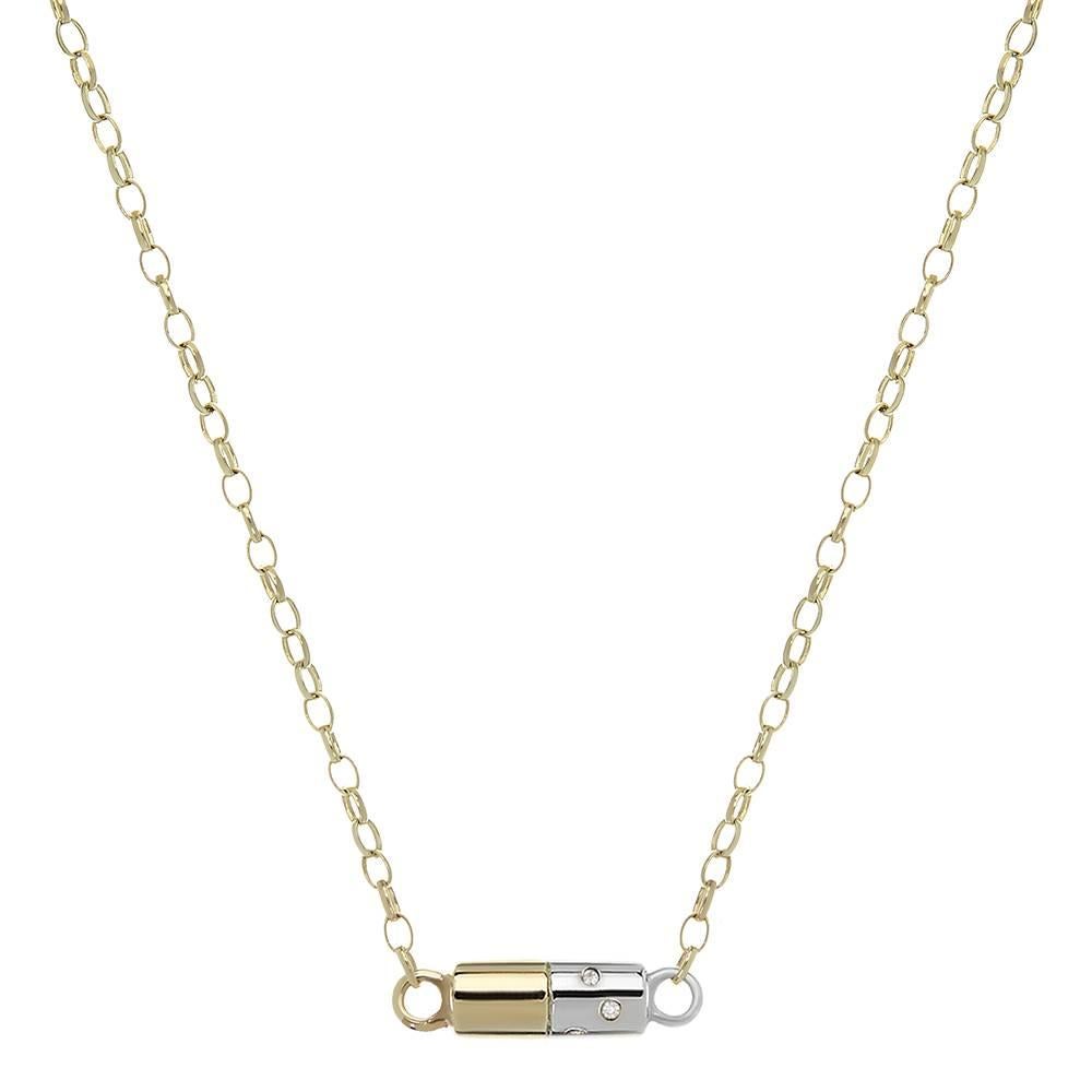 9ct yellow gold, silver and diamond 'Diet Pill' necklace

The irresistible sweet-inspired range, Fat Free, sees the designer bring a playful, tongue-in-cheek quality to fine jewellery. The Diet Pill Necklace is the stylish antidote to cravings and