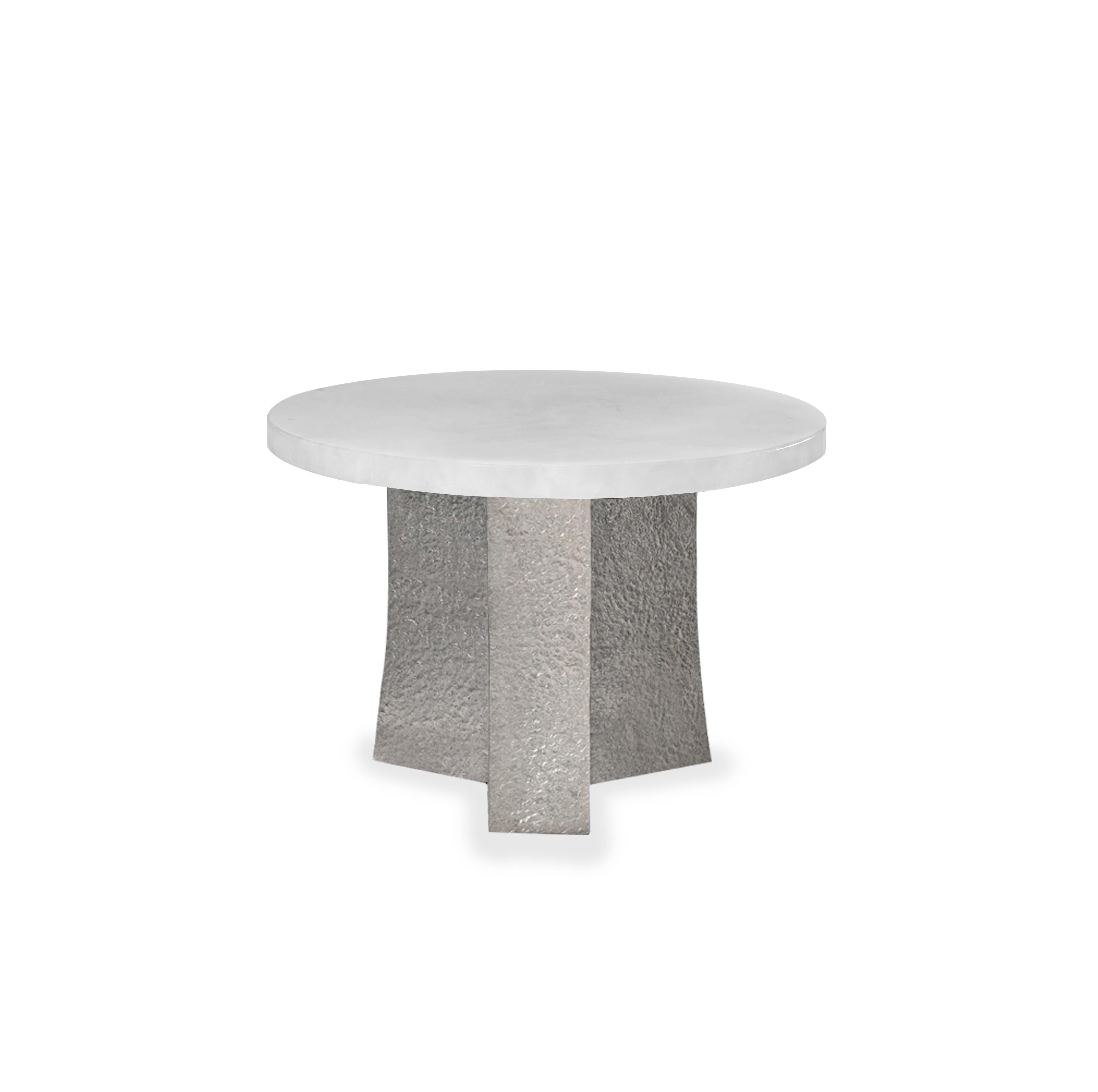 Rock crystal top cocktail table with hammered matte nickel stand. Created by Phoenix gallery.
Custom size and finish upon request.