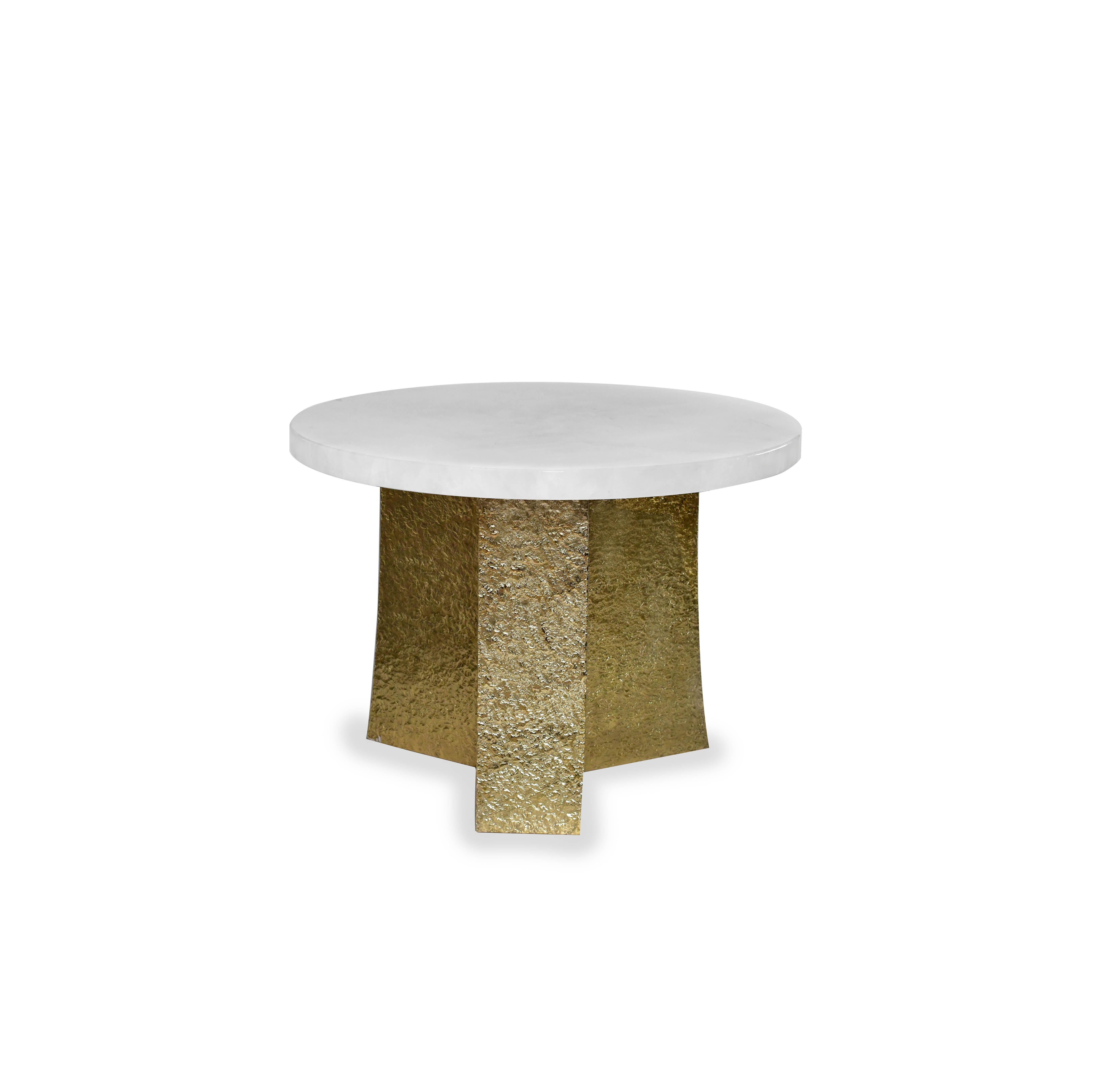 Rock crystal top cocktail table with hammered brass Stand. Created by Phoenix Gallery.
Custom size and finish upon request.