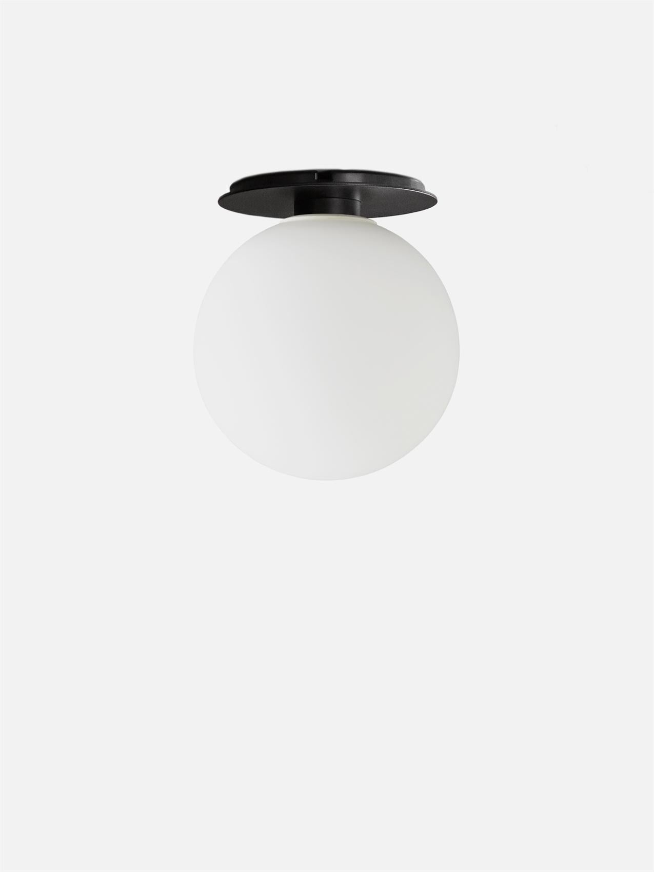 TR Bulb, ceiling/wall lamp, black, Matte Opal Rundle never knows when inspiration will strike. “An idea will often form from a simple observation or noticing a problem, and I’ll keep it at the back of my mind for some time before acting on it. Once