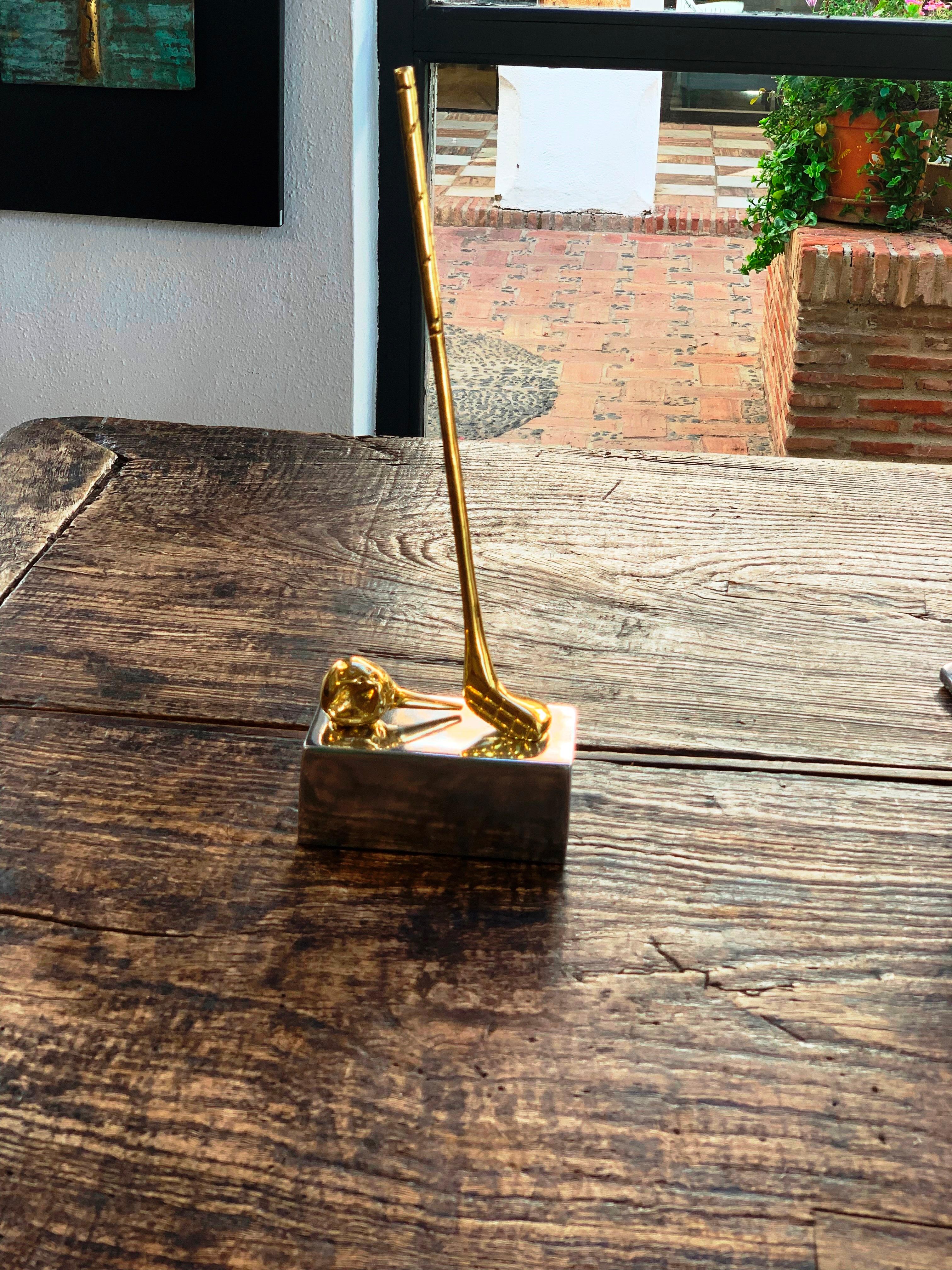 The decorative trophy , was created by David Marshall, it is made of  sand cast brass. 
Handmade, mounted and finished in our foundry and workshop in Spain from recycled materials.
Certified authentic by the Artist David Marshall with his