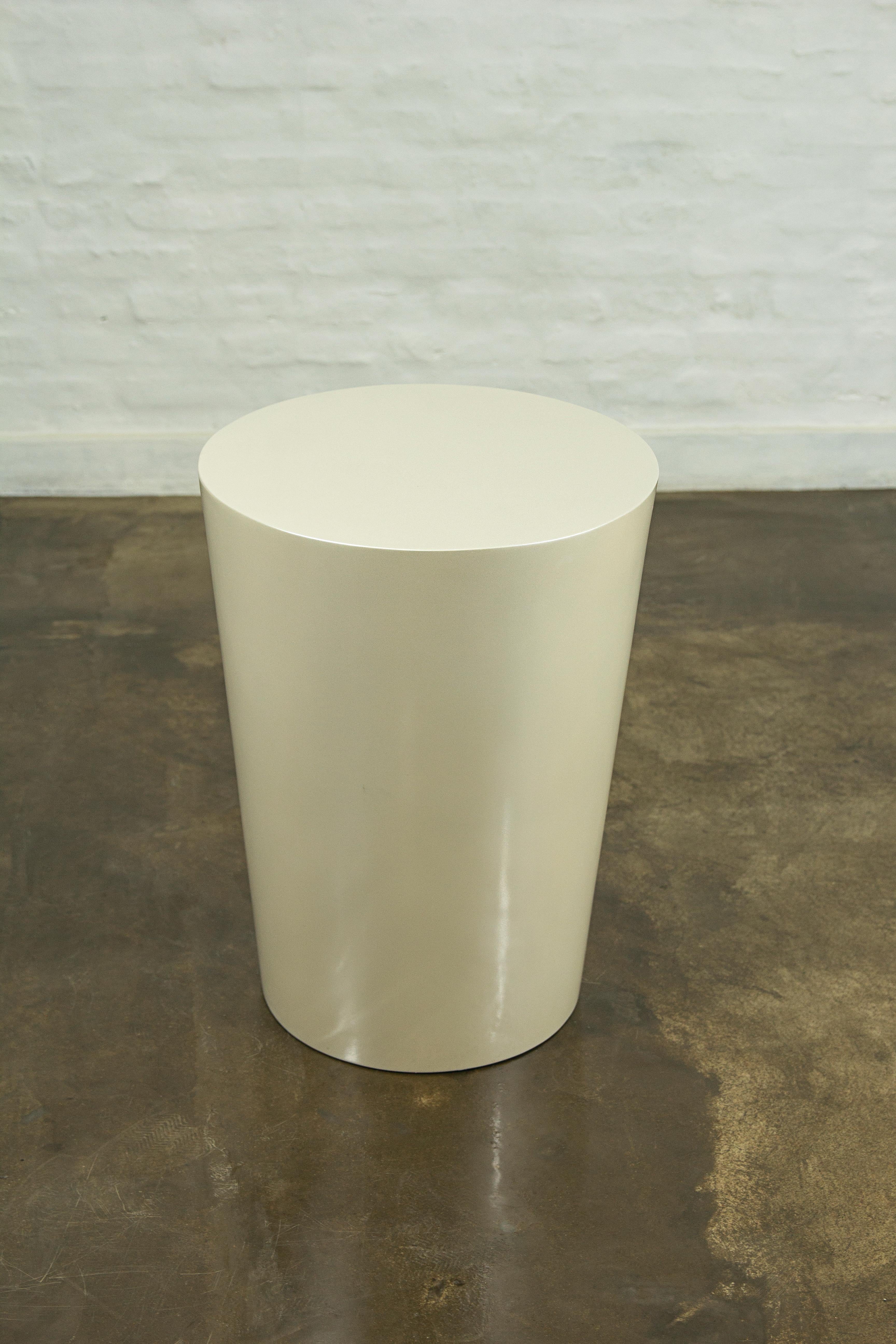 The TR series from Costantini can function as an accent table or a stool. Its unadorned geometric shape begs perfection from its high-gloss finish and complements any style interior with a dash of modern simplicity. 

We have this in stock and