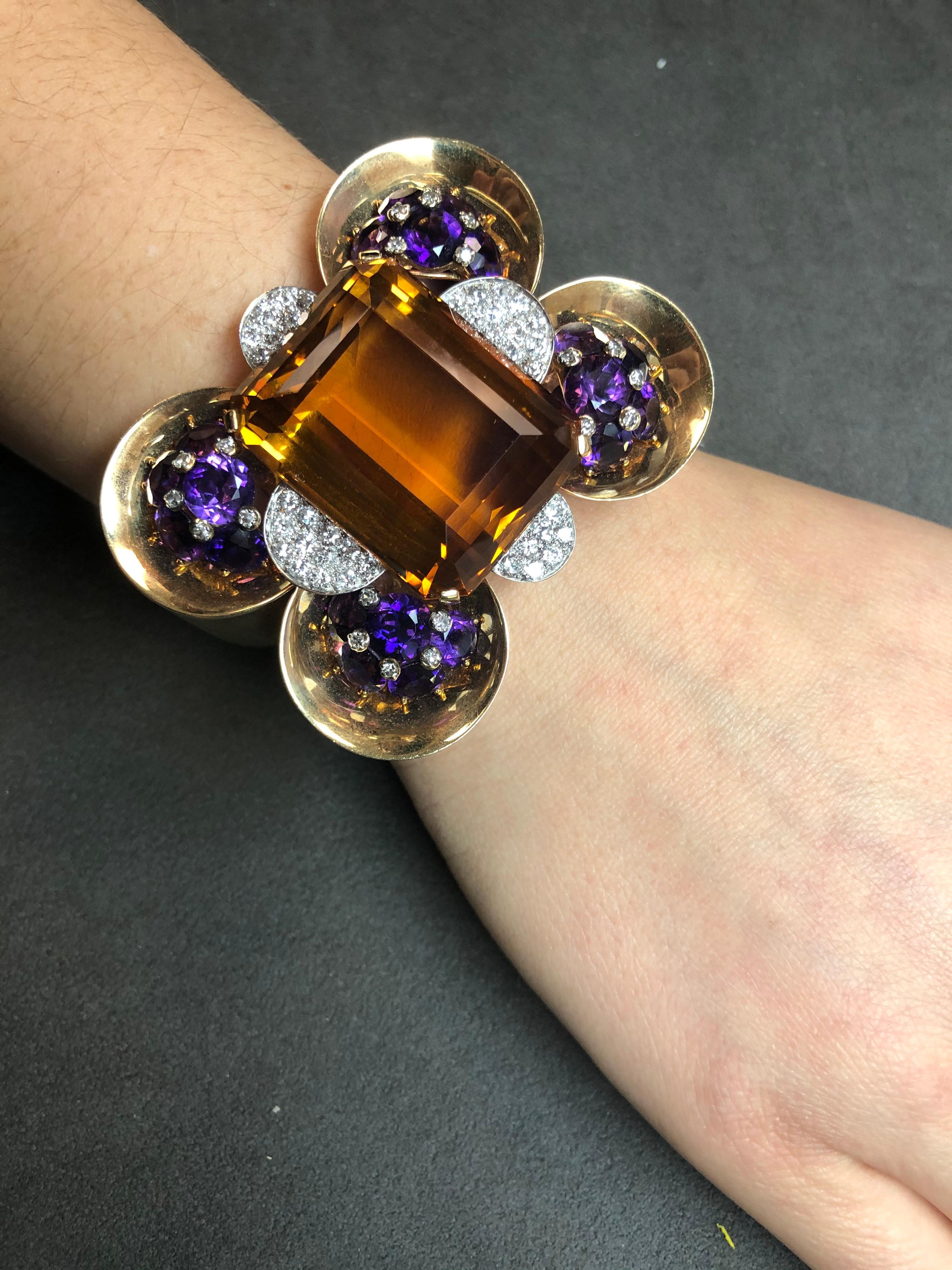 Trabert & Hoeffer Mauboussin Citrine Amethyst Diamond Reflection Bracelet

Un bijou exquis de la collection Reflection du joaillier Trabert & Hoeffer Mauboussin. Le bracelet est élégamment serti de citrine, d'améthyste et de diamants, vers les