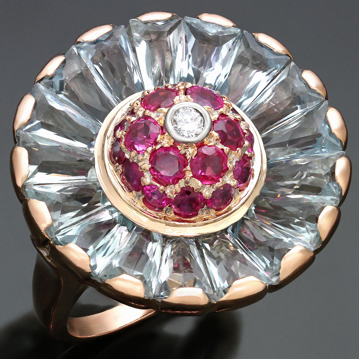 This rare and spectacular 1940s Trabert & Hoeffer Mauboussin ring features a vibrant retro fan design crafted in 14k rose gold and set with 17 french-cut aquamarines weighing an estimated 10 carats, 18 rubies weighing an estimated 1.30 carats, and 1