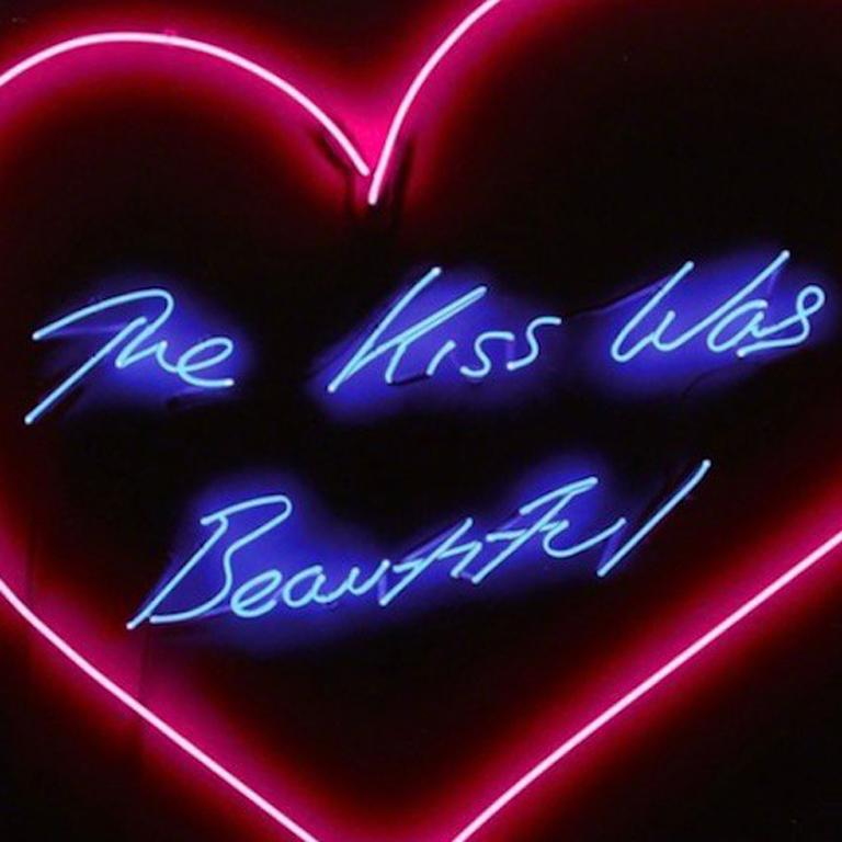 the kiss was beautiful neon sign