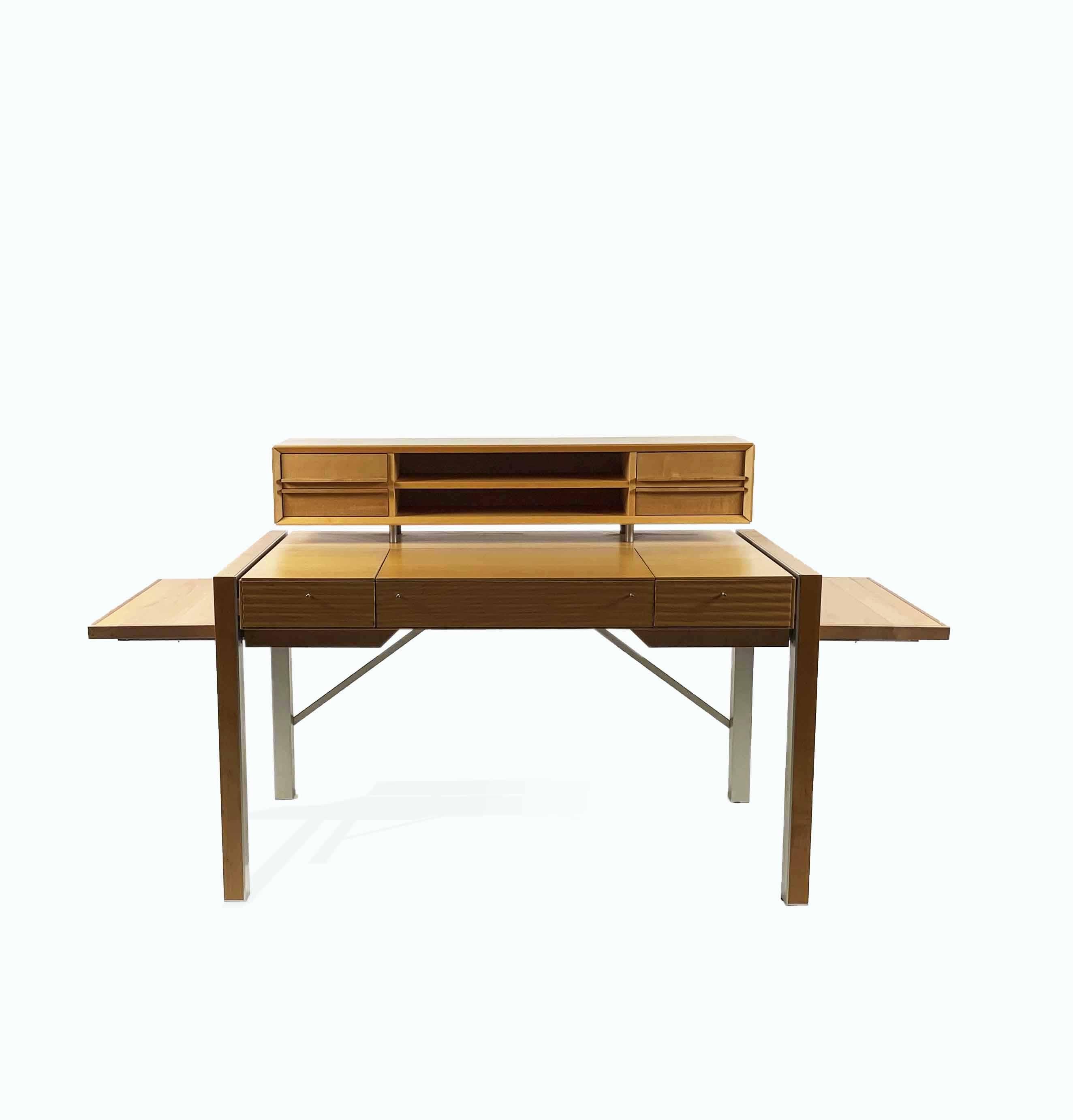 The Tracks writing desk, designed by Naghi Habib in 1999, is part of a product family created for Bernini, based on the concept of an elegant home that caters to the modern need for space rationalization. The Tracks writing desk is a minimal yet
