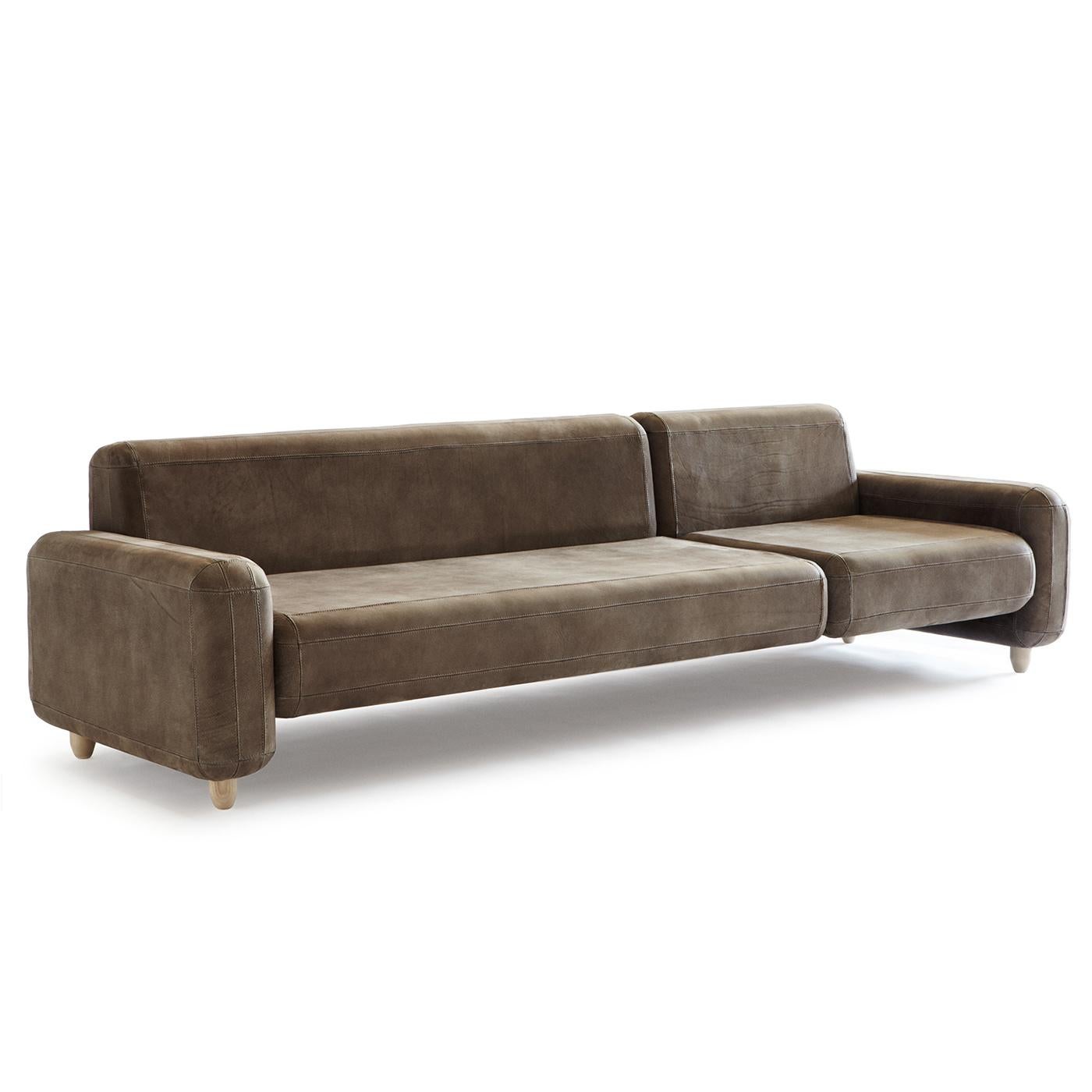 Nothing says understated luxury quite like this Traco Gray Leather Sofa. Sculpted, cool and modern, it provides a wow effect to any setting, whether private or public. The clean lines and visible stitching enhance it’s perfect shape. With a frame