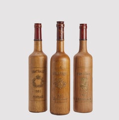 Trade sign for a wine shop: three bottles with french label wine, France 1950.