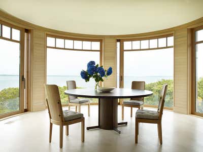 Beach Style Beach House Dining Room. Overlook House by Kligerman Architecture and Design.