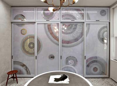  Mid-Century Modern Family Home Storage Room and Closet. Ripple Effect by Harry Heissmann Inc..