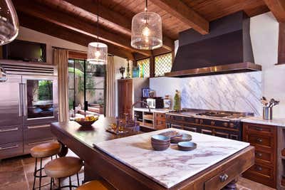 Rustic Vacation Home Kitchen. Laguna Beach by Michael S. Smith Inc..