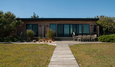  Modern Vacation Home Exterior. Fresh Pond Waterfront by All Things Dirt.
