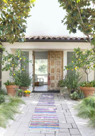  Mediterranean Family Home Exterior. Malibu Ranch by Nickey Kehoe Design.