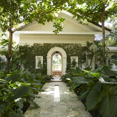  British Colonial Vacation Home Exterior. Tropical Escape by Bunny Williams Inc..