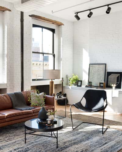  Industrial Living Room. industrial cast iron soho loft - grand street by Becky Shea Design.