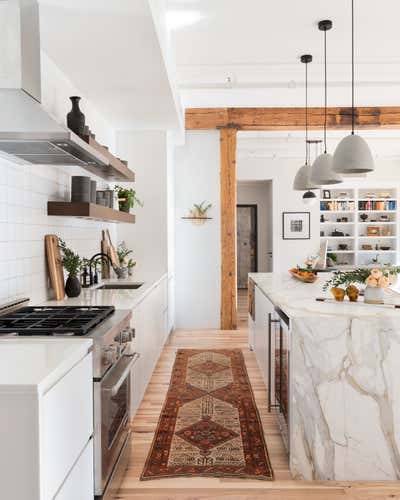 Industrial Apartment Kitchen. industrial cast iron soho loft - grand street by Becky Shea Design.