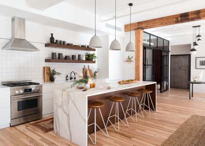 Industrial Apartment Kitchen. industrial cast iron soho loft - grand street by Becky Shea Design.