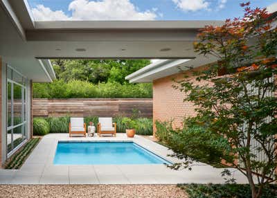  Mid-Century Modern Family Home Exterior. Mid-century Preservation by Ashby Collective.