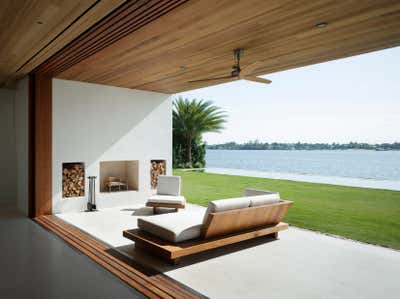 Beach Style Beach House Patio and Deck. House in Florida by 1100 Architect.