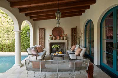 British Colonial Patio and Deck. Beverly Hills, CA  by Mona Hajj Interiors.