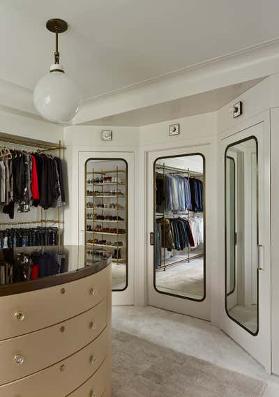 Modern Apartment Storage Room and Closet. Fifth Avenue by Stephens Design Group, Inc..