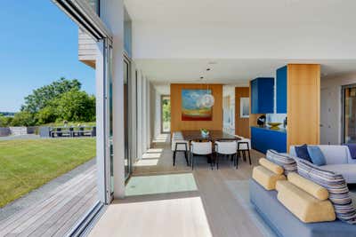  Contemporary Coastal Beach House Dining Room. Modern Oceanside Retreat by Eleven Interiors LLC.
