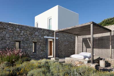  Beach Style Vacation Home Exterior. Mykonos Seafront Villa by Anna-Maria Coscoros Interior Design.