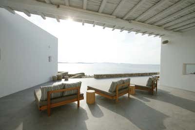  Beach Style Vacation Home Exterior. Mykonos Seafront Villa by Anna-Maria Coscoros Interior Design.
