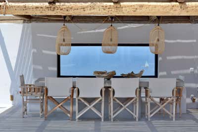  Beach Style Exterior. Kea Seafront Villa by Anna-Maria Coscoros Interior Design.