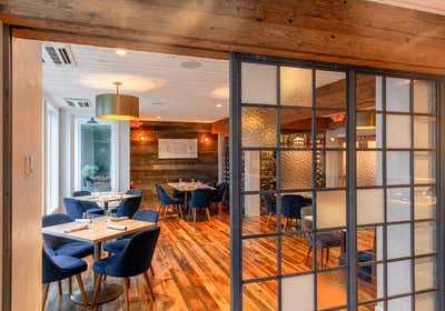  Mid-Century Modern Coastal Restaurant Dining Room. The Shipwright's Daughter by Assembly Design Studio.