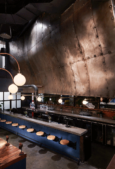 Industrial Restaurant Bar and Game Room. The Hull by Boldt Studio.