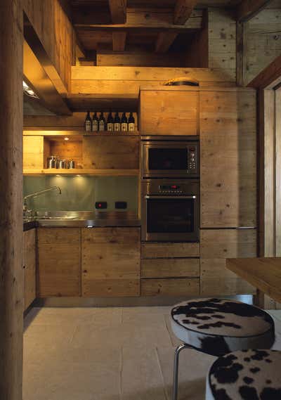  Cottage Kitchen. House in the mountains_Cortina d'Ampezzo by Mario Mazzer Architects.