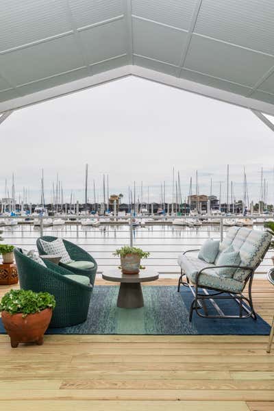  Eclectic Coastal Vacation Home Patio and Deck. Roadway Boat House by Eclectic Home.