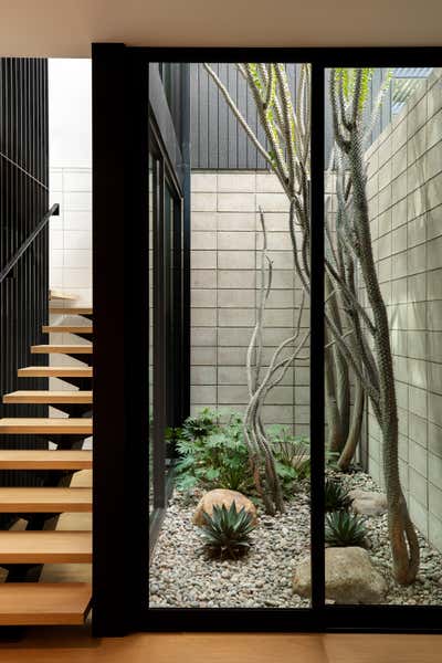  Minimalist Family Home Entry and Hall. Pine Needles by Michael Hilal.