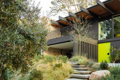  Mid-Century Modern Family Home Exterior. Pine Needles by Michael Hilal.
