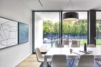  Minimalist Family Home Dining Room. Floating Boxes by Maydan Architects.