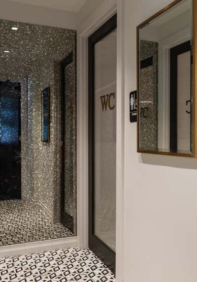 Eclectic Restaurant Bathroom. GJ Tavern by Nest Design Group.
