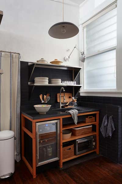  Minimalist Mid-Century Modern Office Kitchen. Lyon Creative Agency by Landed Interiors & Homes.