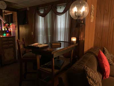 Rustic Mixed Use Bar and Game Room. Pub Table by Everything Ellis Designs.